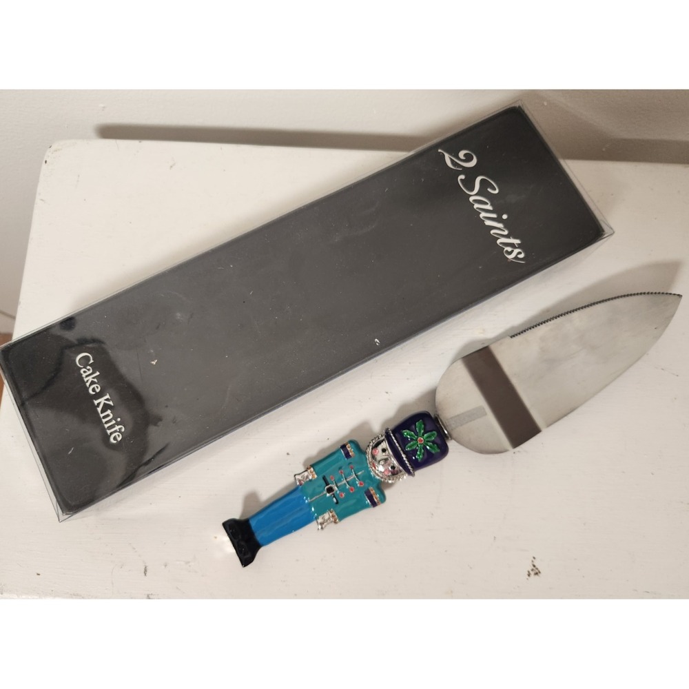 2 Saints Christmas Cake Pie Knife Server Enamel Nutcracker Soldier Signed Holly‎
